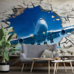 Fotomurales Jet irrumpe a través de la pared agrietada