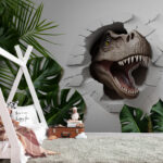 Fotomurales Dinosaurio emerge a través de pared agrietada