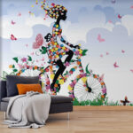 Fotomurales Mujer en bicicleta con flores
