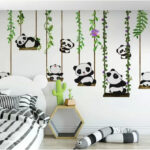 Fotomurales Grupo de pandas en columpios