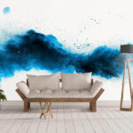 Fotomurales Explosión de polvo azul sobre fondo blanco