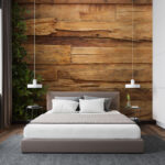 Fotomurales Pared de madera desgastada con vegetación