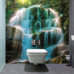 Fotomurales Mística cascada en un frondoso bosque