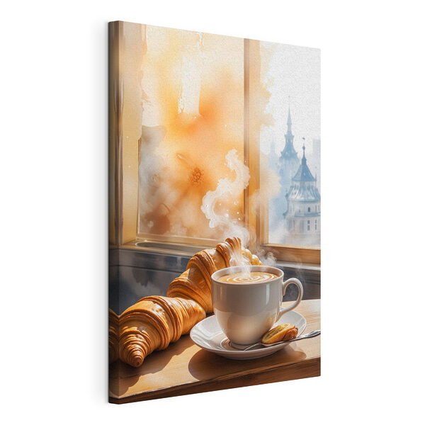 Cuadros Una taza de café y unos cruasanes sobre una mesa