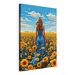 Cuadros Una mujer con un vestido azul en un campo de girasoles