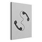 Cuadros Un auricular de teléfono negro sobre una superficie blanca