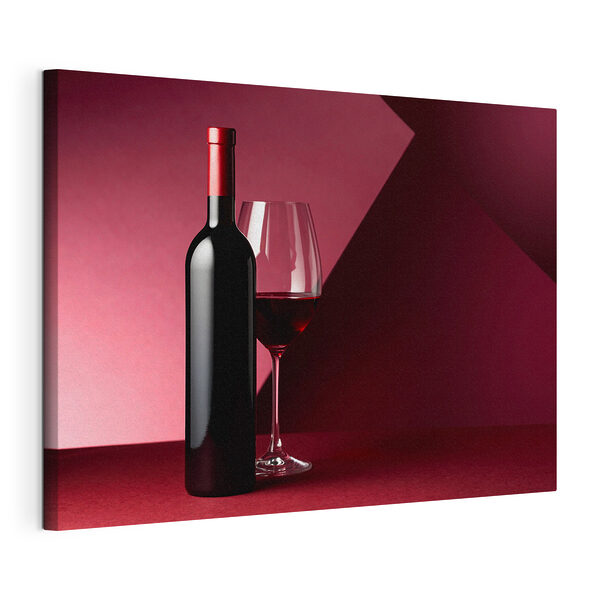 Cuadros Una botella de vino junto a una copa de vino
