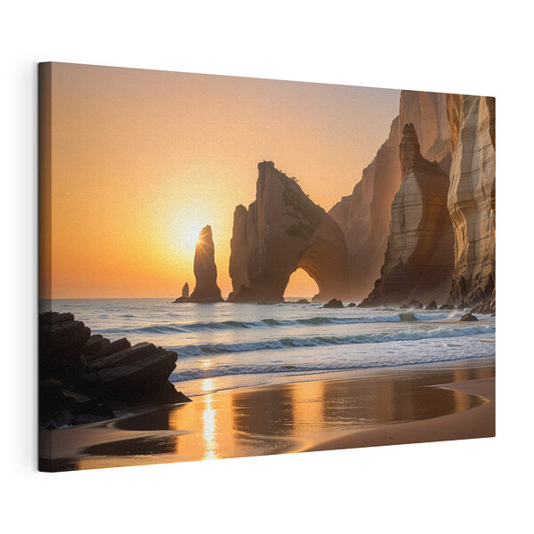 Cuadros Puesta de sol sobre una playa con rocas y agua