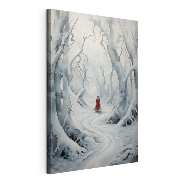 Cuadros Una persona con una capa roja que camina por un bosque nevado